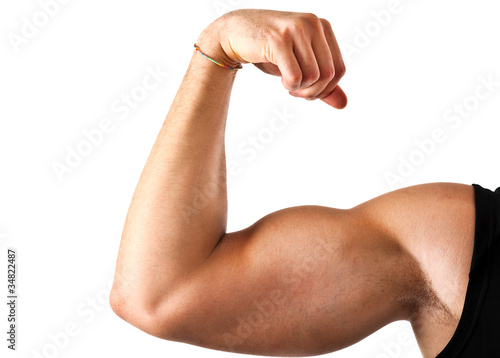 Fitness man showing his muscles