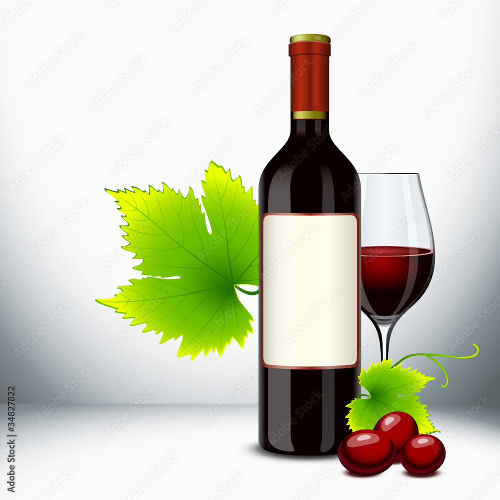 Obraz premium Red wine glass and bottle