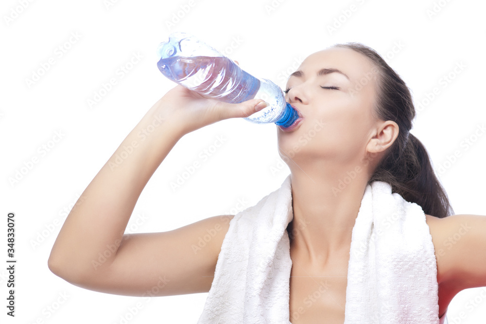 sportswoman with bottle of pure water drinking with pleasure iso sportswoman with bottle of pure water drinking with pleasure iso
