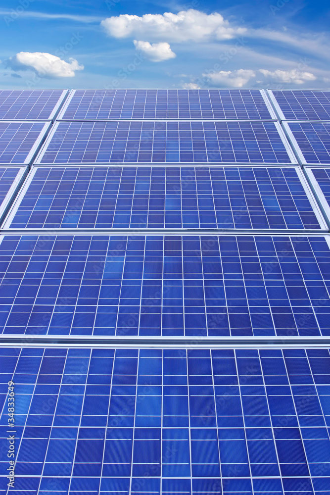 Solar panels and sky vertical Solar panels and sky vertical