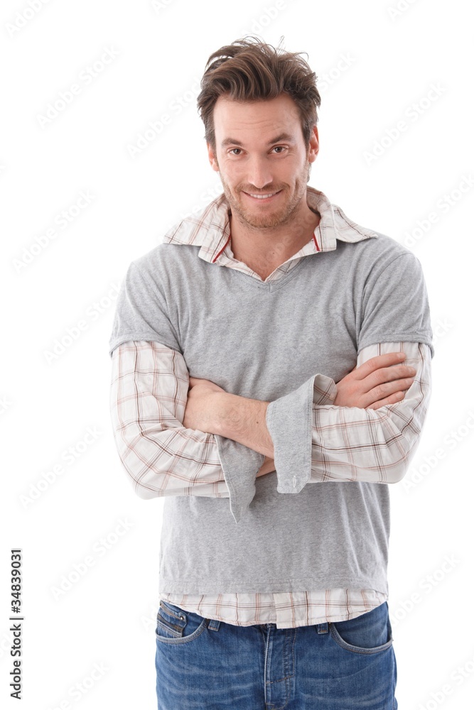 Casual man looking questioningly smiling Casual man looking questioningly smiling