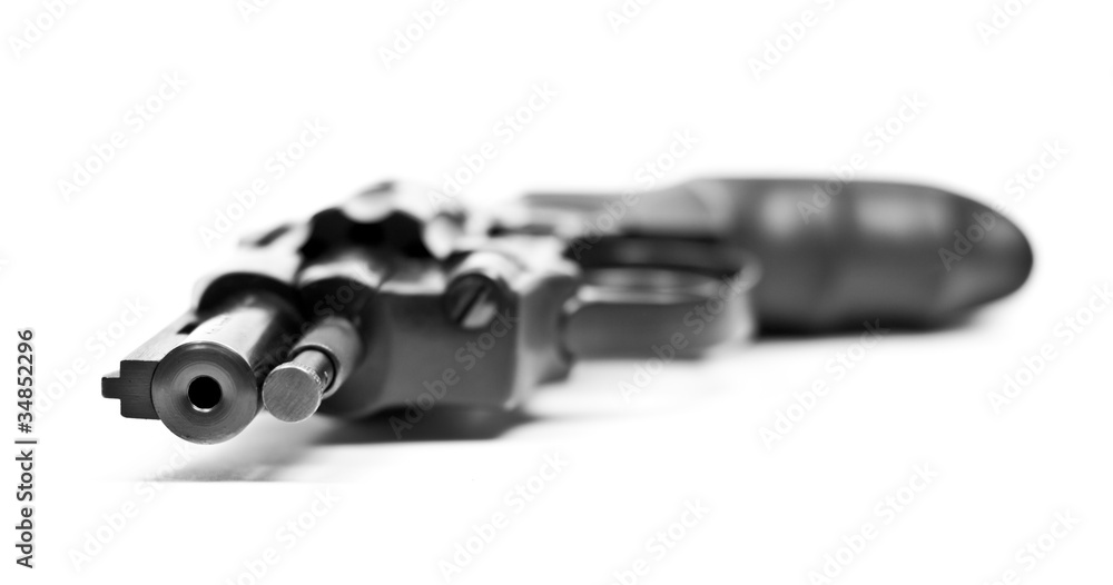Black revolver gun with little depth of field Black revolver gun with little depth of field