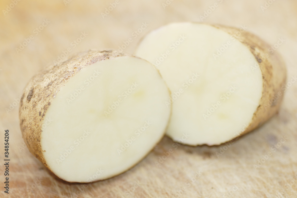One Kestrel potato cut in half. One Kestrel potato cut in half.