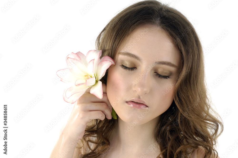 young cute girl holding orchid flower in her hands young cute girl holding orchid flower in her hands