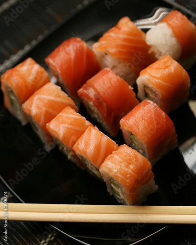 Japanese sushi on black plate