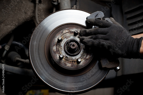 Car mechanic repair brake pads