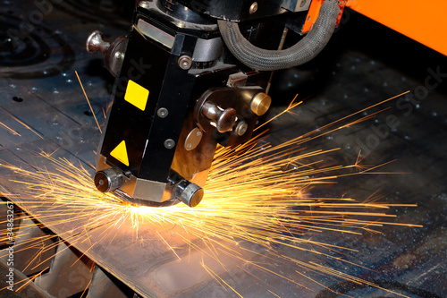 industrial laser with sparks flying around