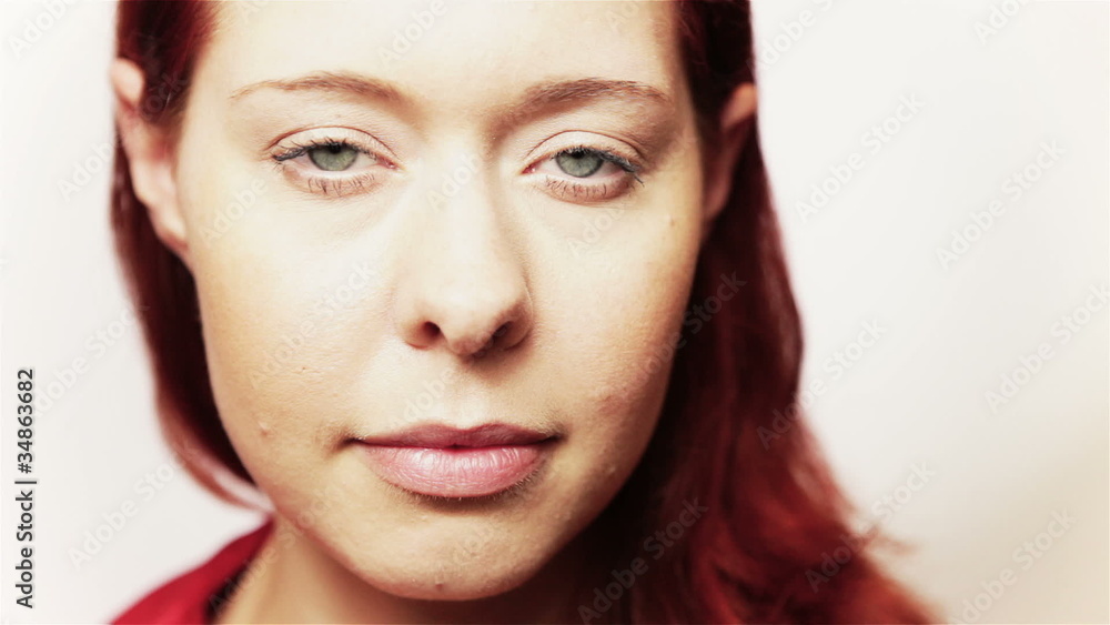 Redhead woman opening her eyes Redhead woman opening her eyes