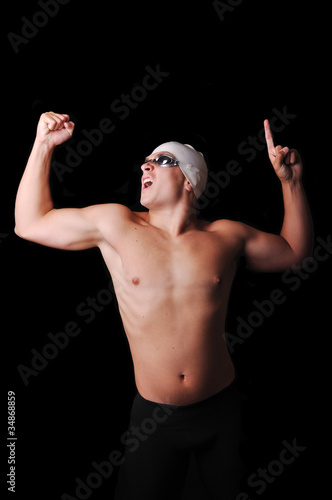 Male swimmer celebrate isolated in black