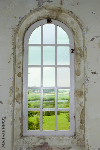 old church window with view