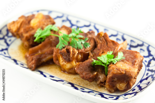 Pork ribs with sweet sauce on white background