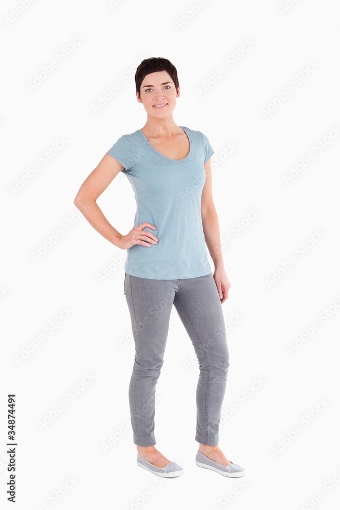 Good looking woman posing while standing up Good looking woman posing while standing up
