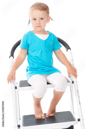 Child portrait on the chair in studio