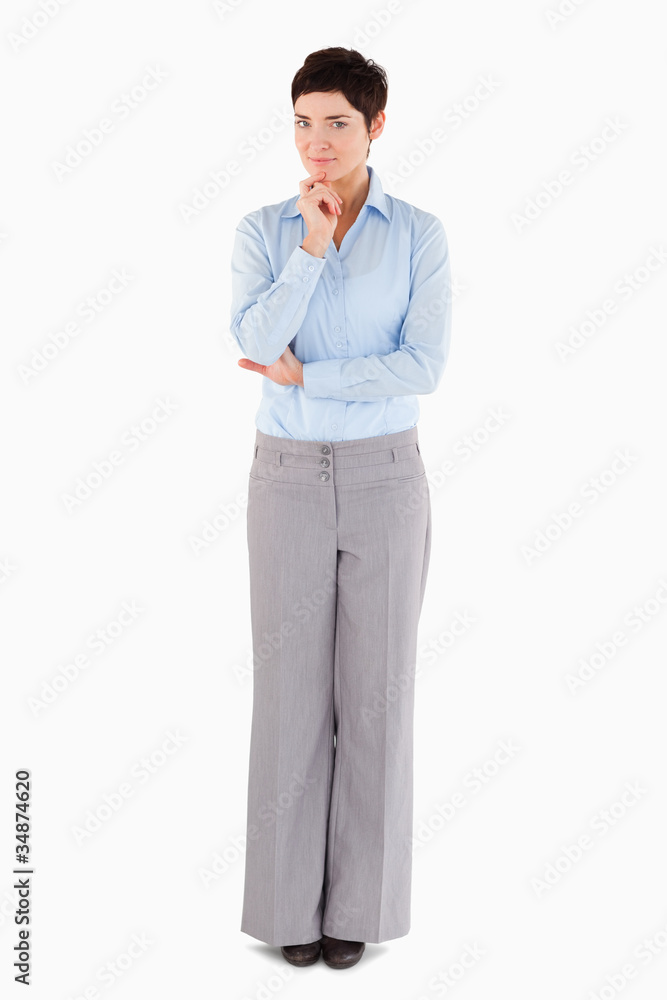 Thoughtful businesswoman standing up Thoughtful businesswoman standing up
