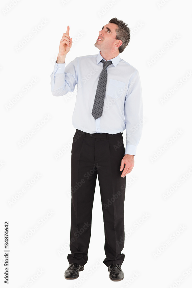 Man pointing at copy space