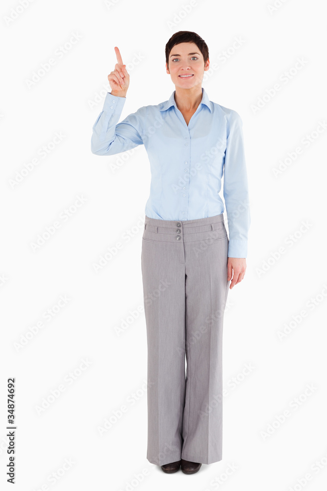 Woman pointing at copy space Woman pointing at copy space