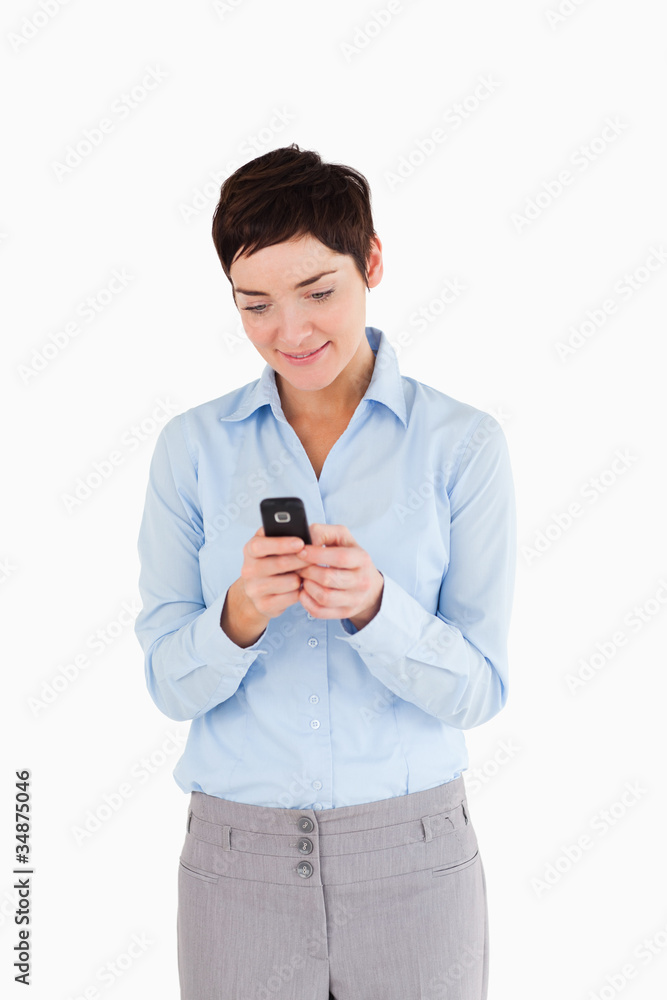 Portrait of a businesswoman sending text messages Portrait of a businesswoman sending text messages