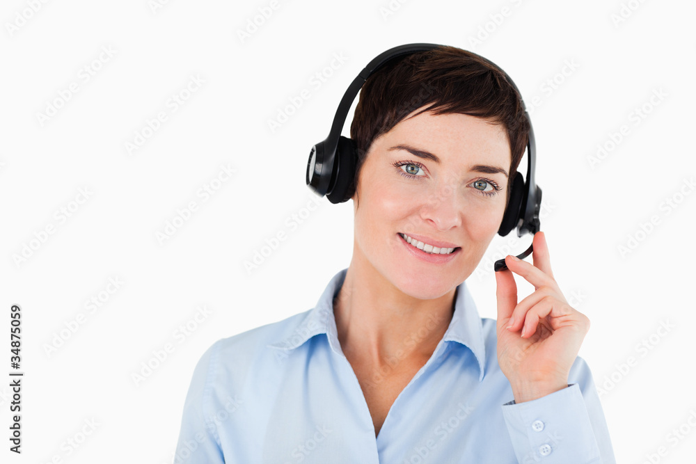 Close up of a secretary using a headset Close up of a secretary using a headset