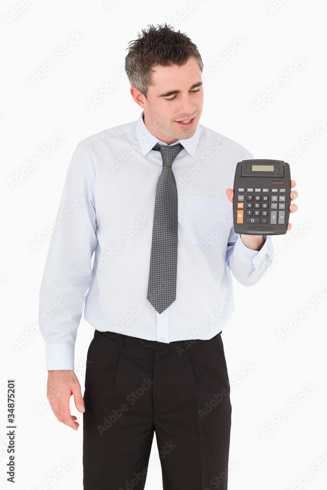 Accountant looking at a calculator Accountant looking at a calculator