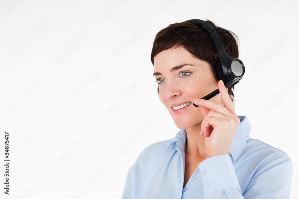 Close up of a office worker using a headset Close up of a office worker using a headset