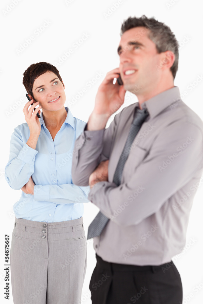 Portrait of office workers making a phone call Portrait of office workers making a phone call