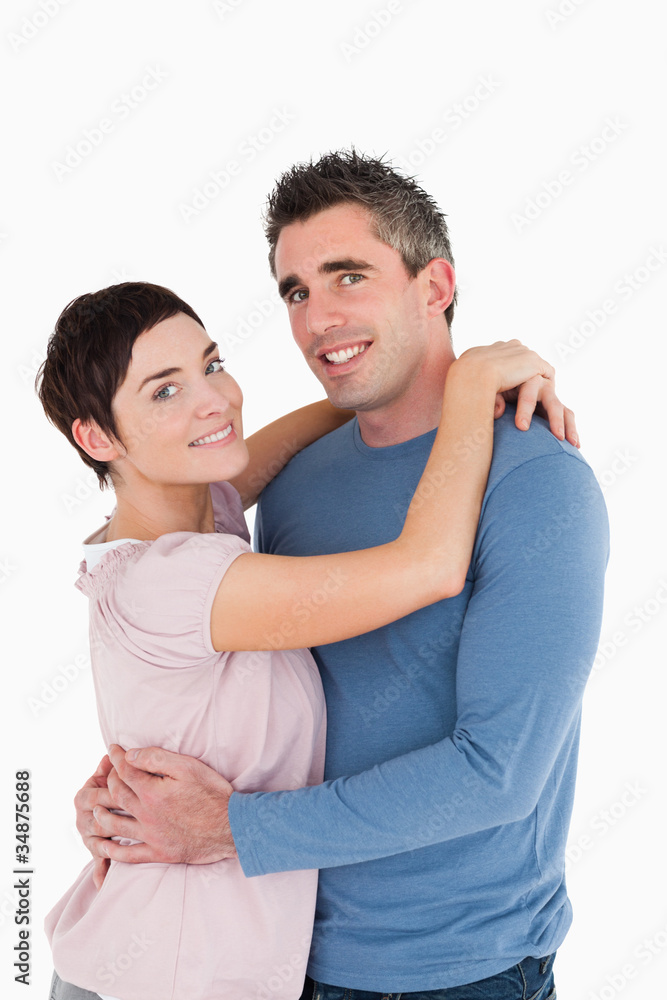 Portrait of a couple embracing each other Portrait of a couple embracing each other