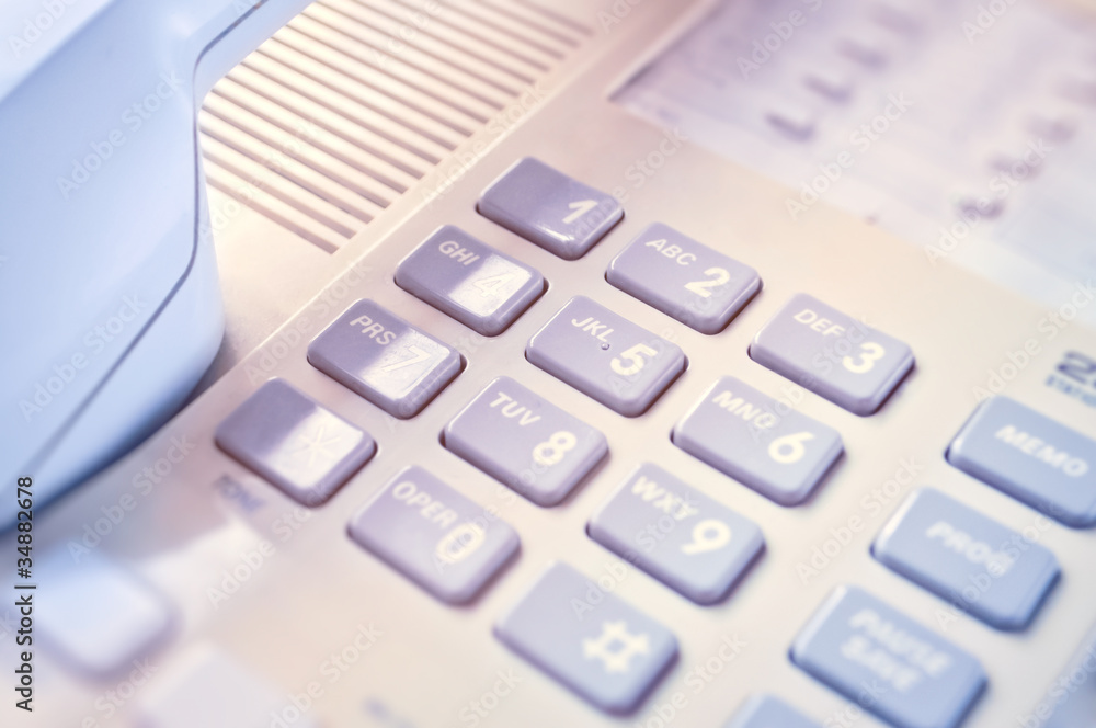 This is closeup of wired desktop telephone - studio shot This is closeup of wired desktop telephone - studio shot