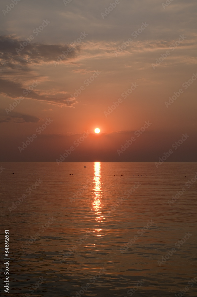 Sunrise over sea in summer day