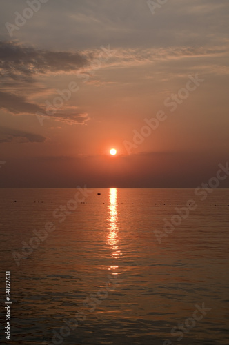 Sunrise over sea in summer day