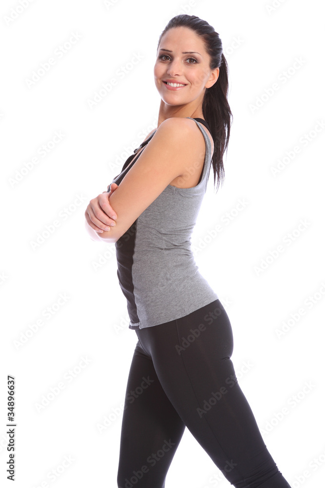 Smiling happy fitness woman arms folded in studio Smiling happy fitness woman arms folded in studio