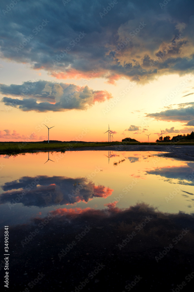 Wind turbines reflection in the water Wind turbines reflection in the water