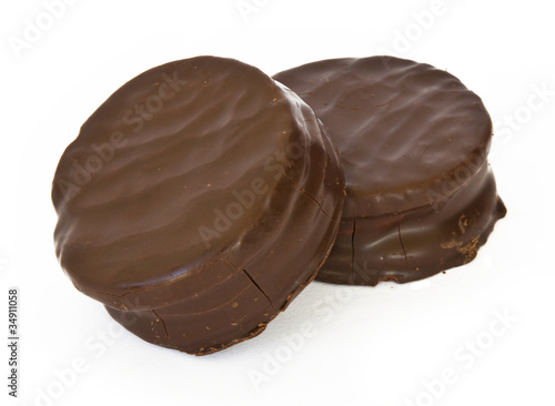 Argentinian alfajor covered with chocolate. photo