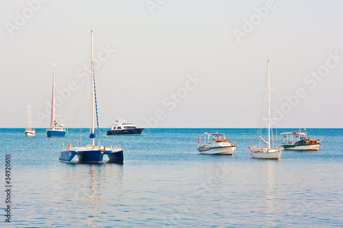Several yachts and boats in the beautiful sea.