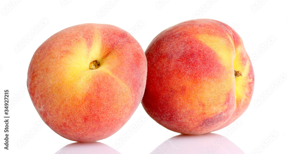 Fresh peaches isolated on white