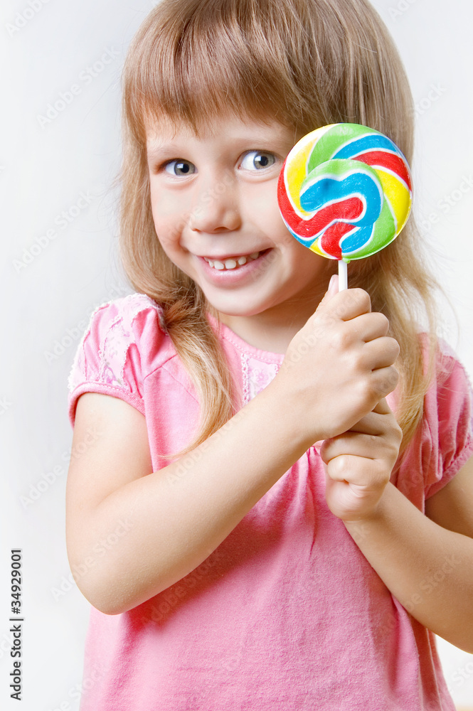 Girl with big lollipop