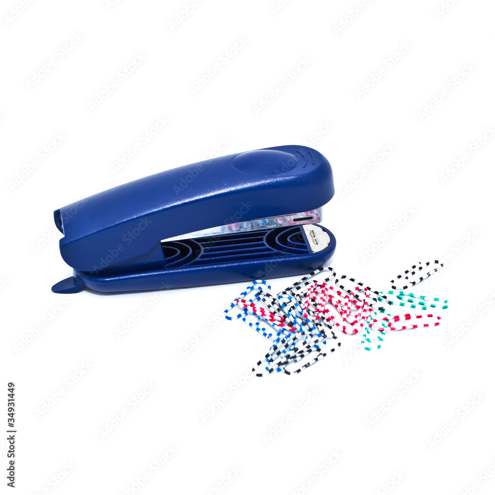 Paper clips and stapler isolated on white Paper clips and stapler isolated on white