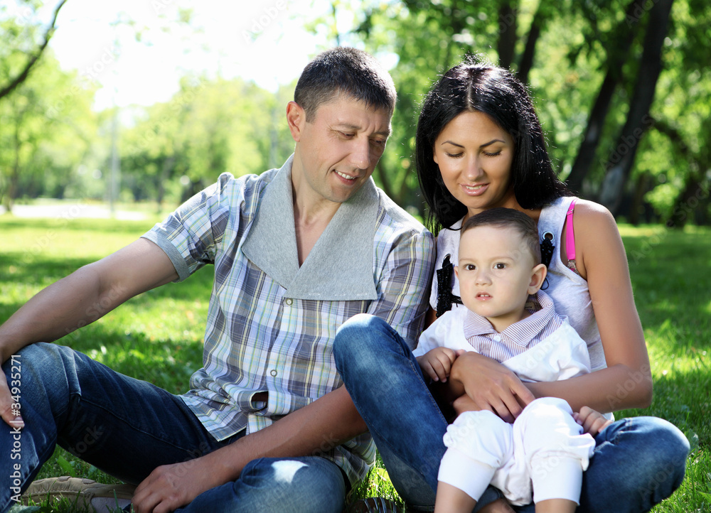 Family together in the summer park