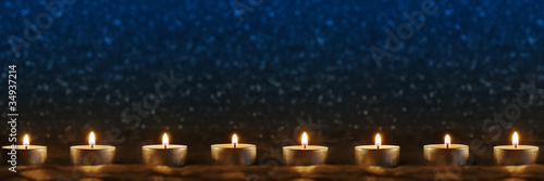 Candles on blue background