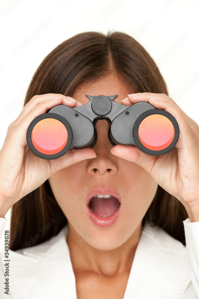 Binoculars woman looking surprised Binoculars woman looking surprised