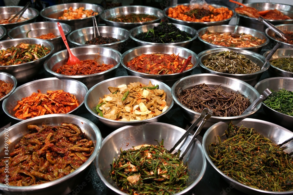 Fototapeta premium Bowls of kimchi on a Korean traditonal food market