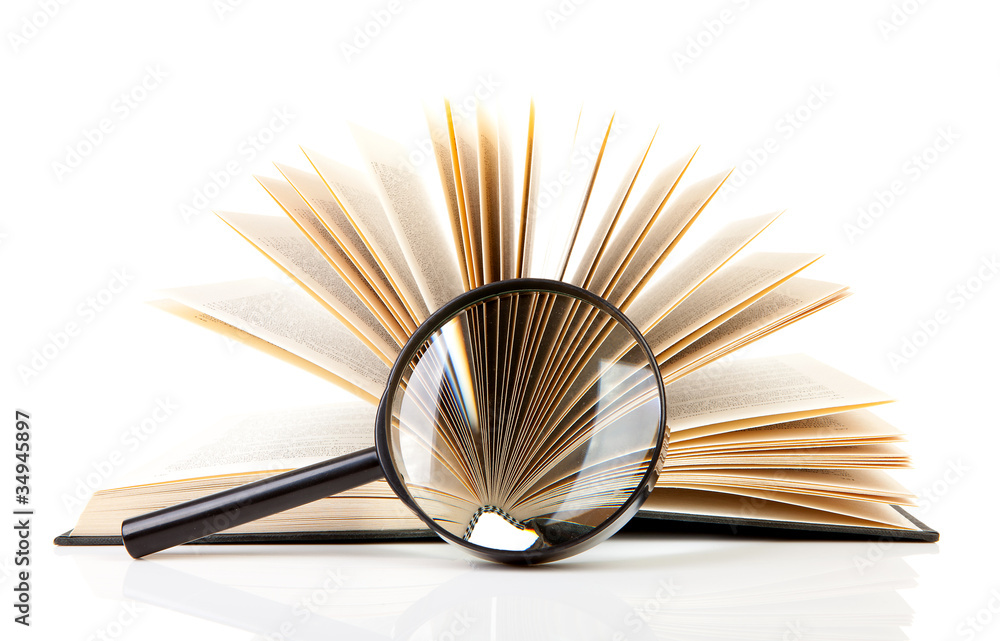 open book with magnifying glass