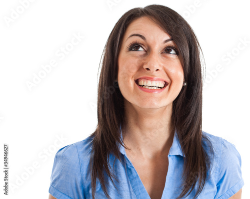 Happy woman looking up. Isolated on white