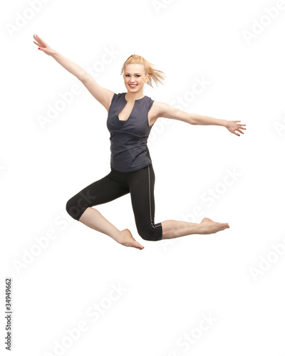 Fototapeta Naklejka Na Ścianę i Meble -  jumping sporty girl