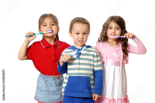 Children with tooth-brushes. Isolated on white