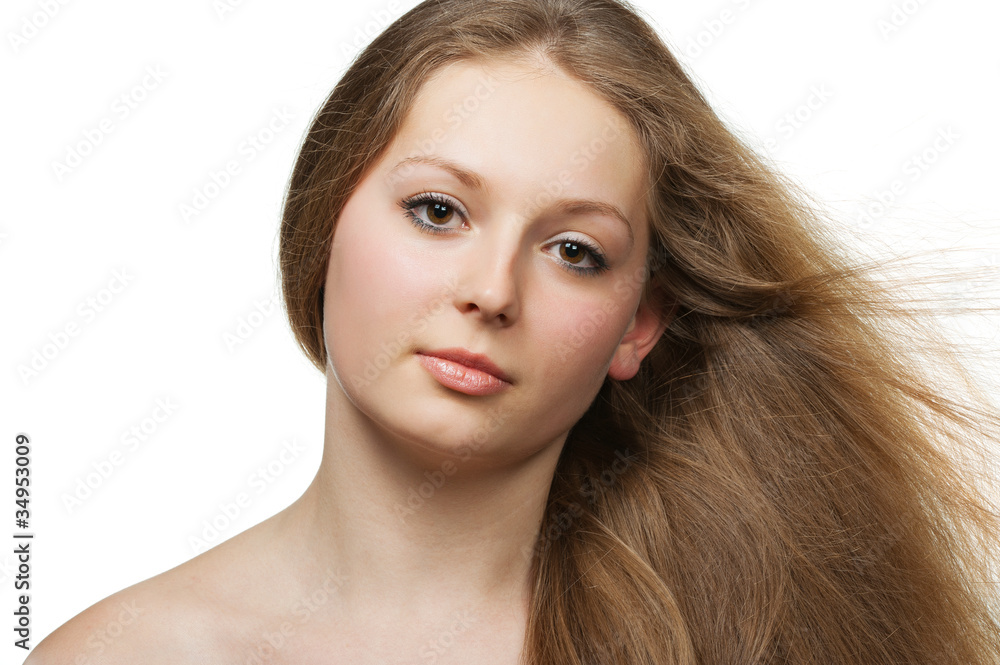 Healthy beautiful long hair closeup in motion created by wind Healthy beautiful long hair closeup in motion created by wind