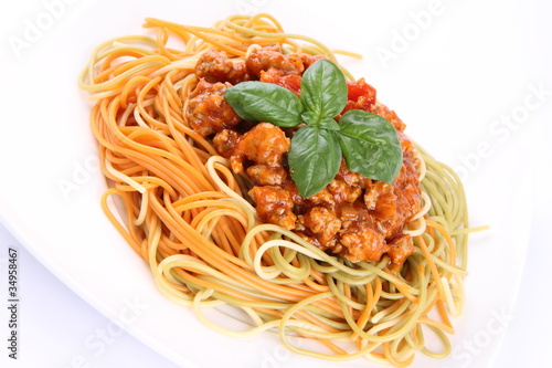 Colorful Spaghetti bolognese on a plate