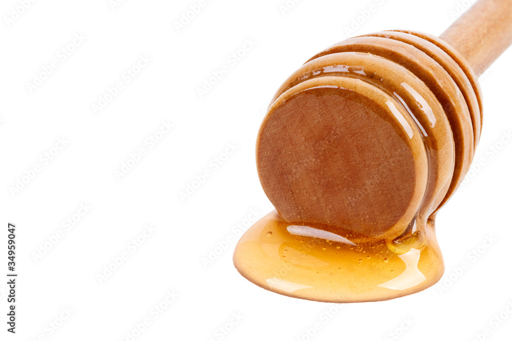 Palo con miel derramada foto de Stock | Adobe Stock