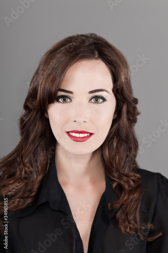 Portrait of a beautiful brunette woman smiling