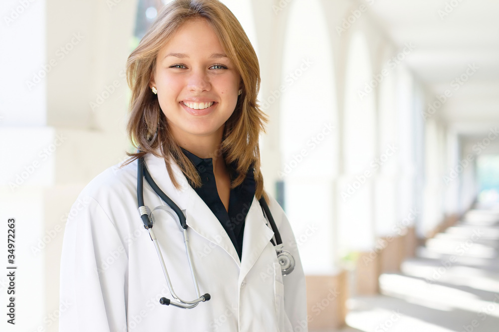 Smiling young female doctor Smiling young female doctor