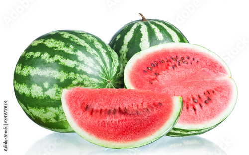 Two Whole watermelon, half and Slice isolated on a white backgr
